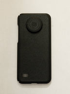 Black phone case with a textured finish on a light beige background
