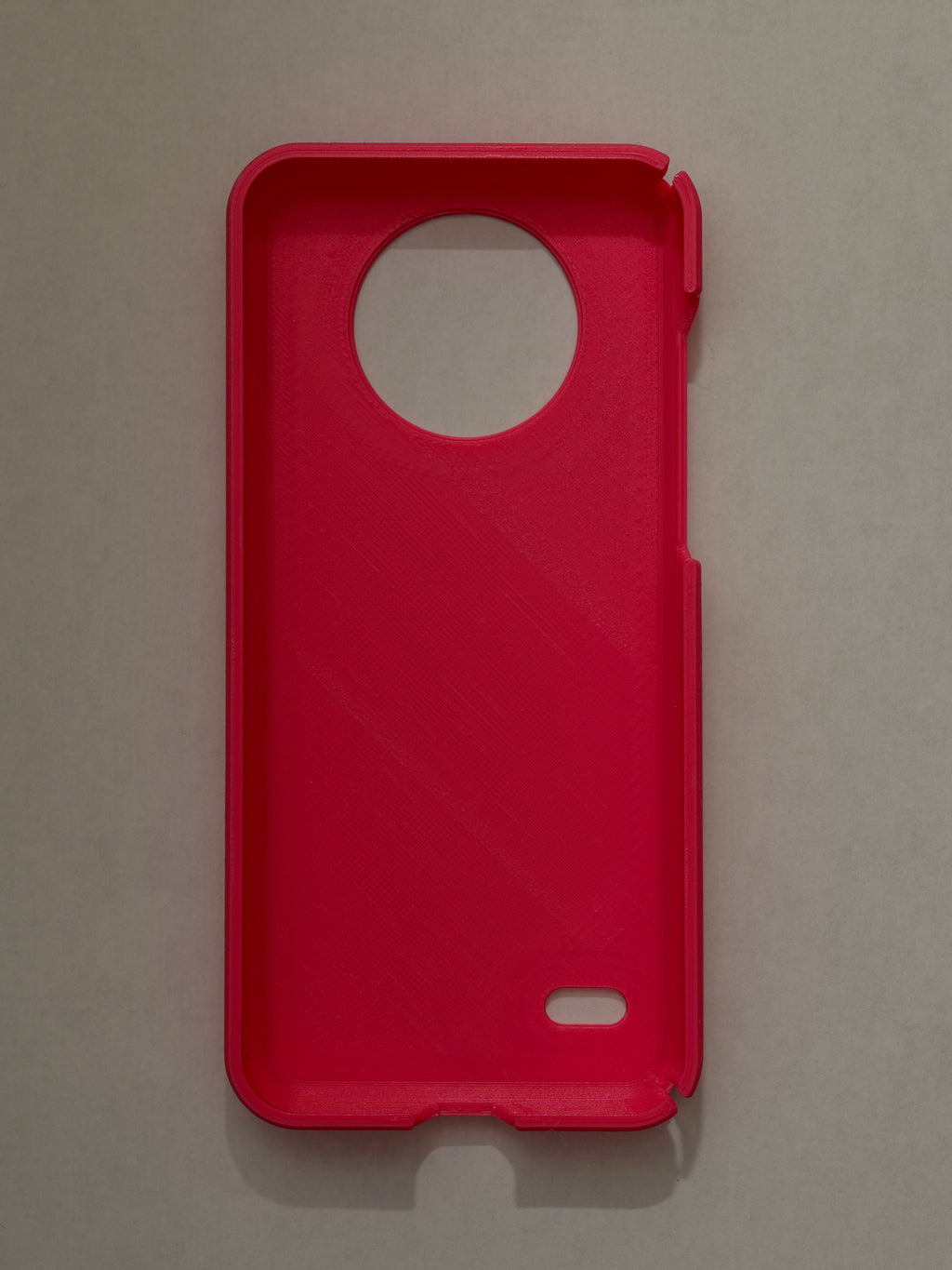 pink phone case on a beige background