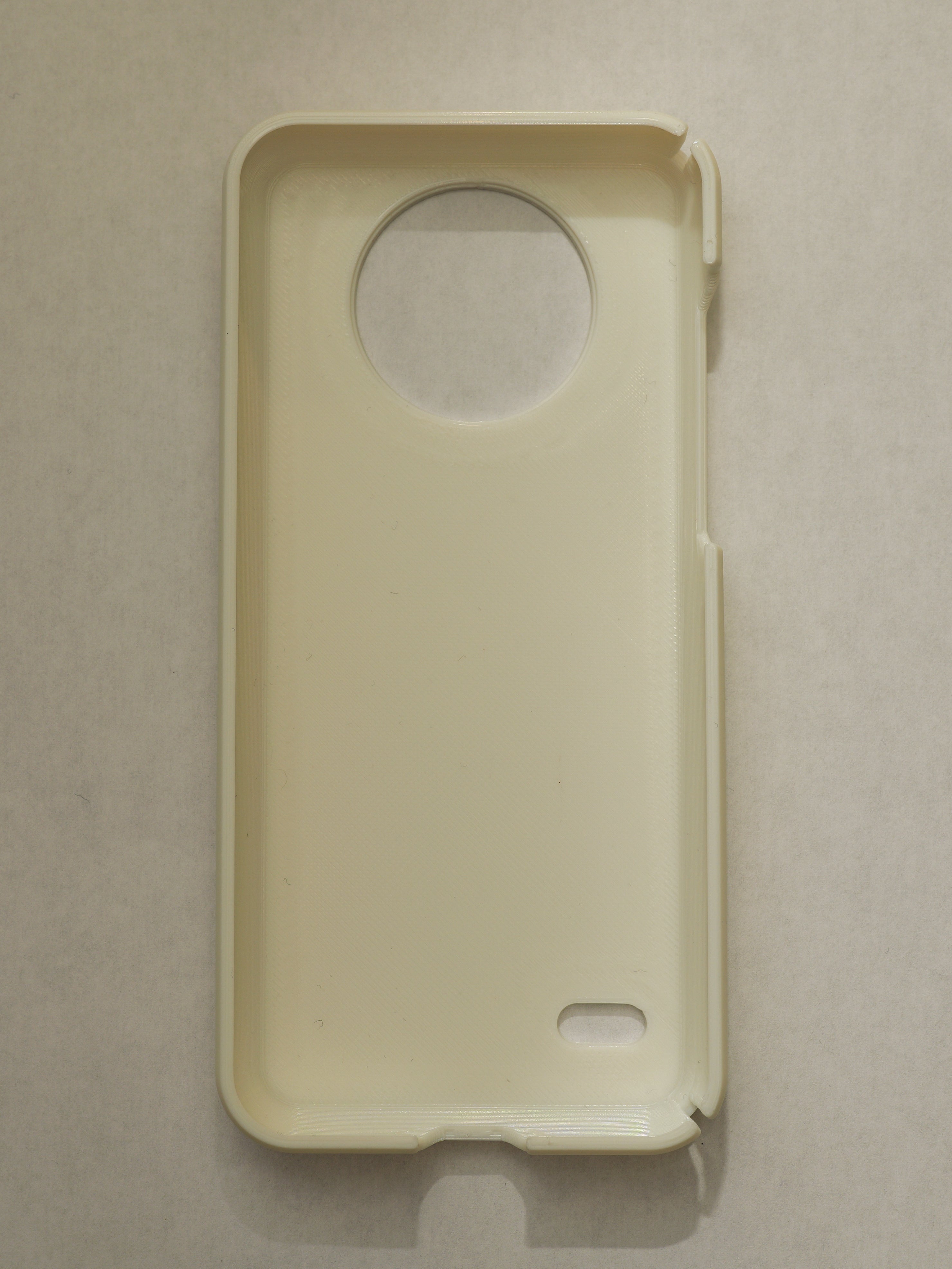 Beige phone case on a beige background