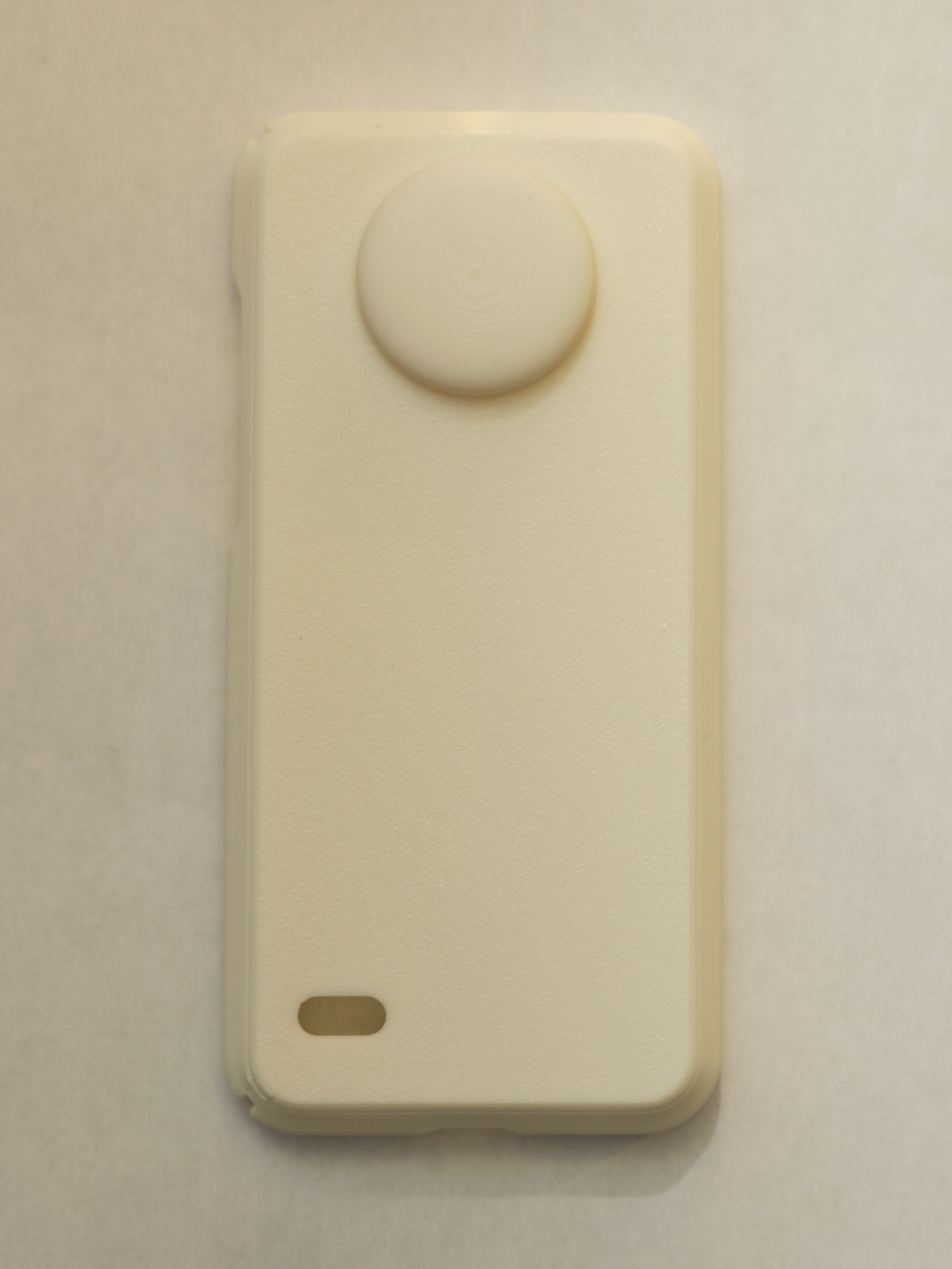 Beige electronic device on a beige background