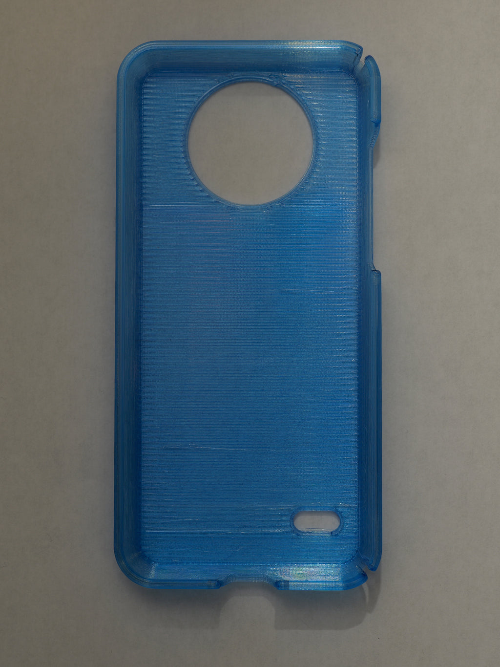 Blue phone case on a gray background